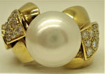 Australian pearl set in a magnificent gold and diamond ring  seen in front