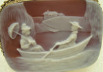 Carnelian stone cameo depicting a romantic boat ride  viewed with details