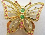 Butterfly with gemstones inserted into an 18-karat gold necklace