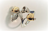 Festive bells designed in a stunning 18K gold ring with diamonds and with movable hammer with details