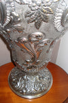 Silver amphora chiseled by hand with details and design