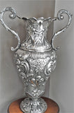 Silver amphora chiseled by hand