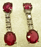 Burmese rubies set in an 18-karat gold earring with diamonds