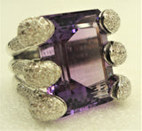 Amethyst ring set with 6 snake mouths filled with brilliants